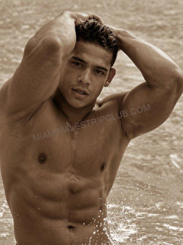 Alex, Miami male dancer, shirtless in the surf