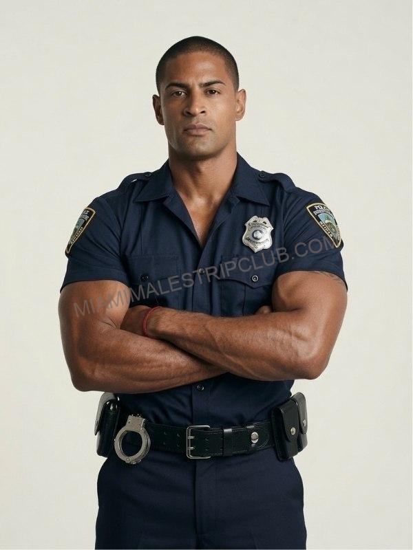 Miami male dancer Luis in a full police officer uniform