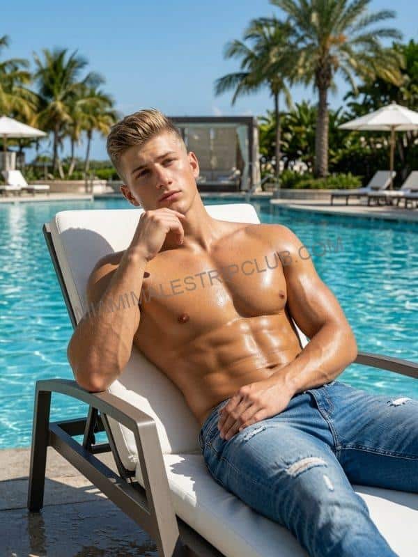 Miami male dancer Tommy Gunn poolside at a resort