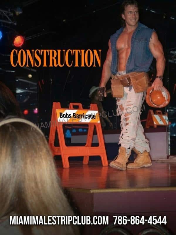 Construction worker stripper performing on stage at a Miami show