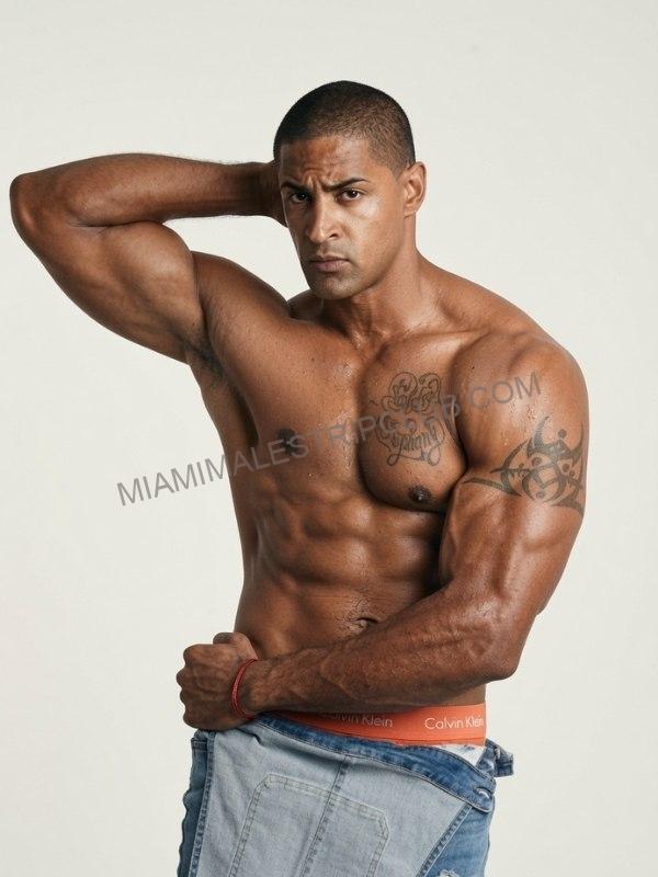 Luis, male stripper in Miami, shirtless in jeans