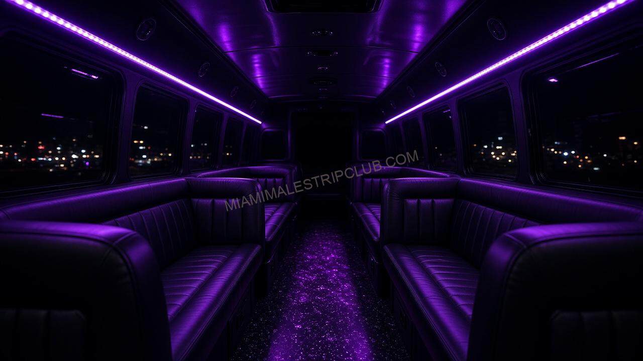 Empty party bus aisle with purple interior lighting